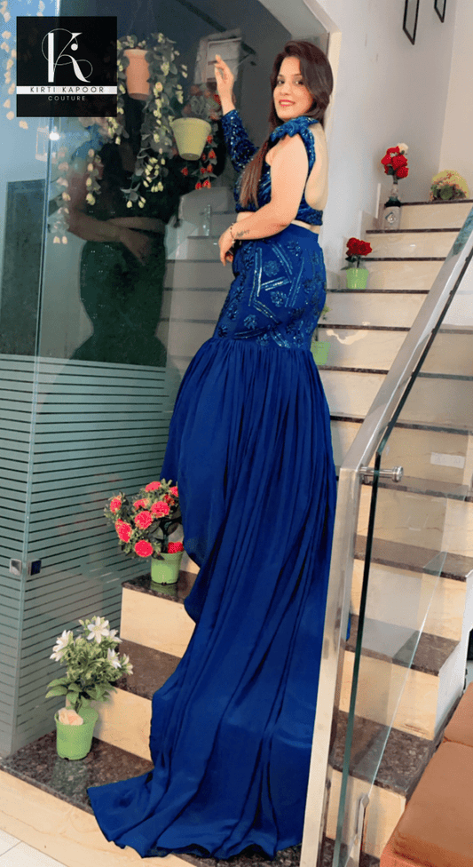 Blue Heavy Choli and fish - cut skirt with attached trail - Kirti Kapoor Couture