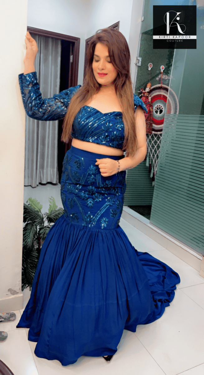 Blue Heavy Choli and fish - cut skirt with attached trail - Kirti Kapoor Couture
