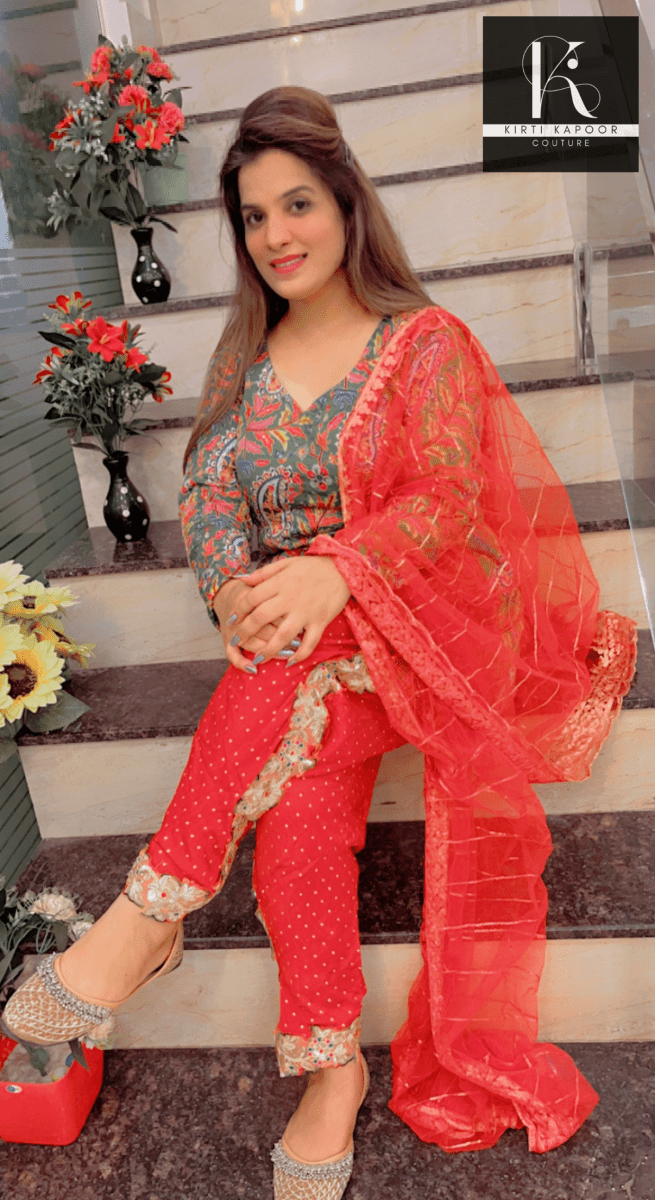 Green Peplum Dhoti Suit With Red Dupatta - Kirti Kapoor Couture