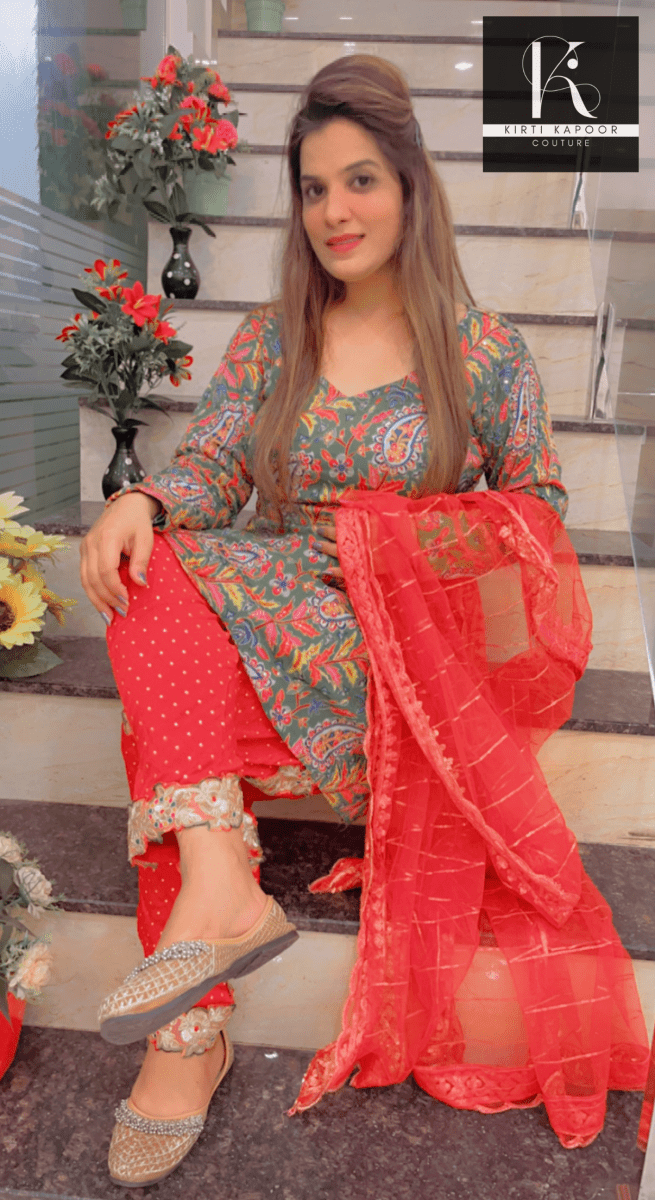 Green Peplum Dhoti Suit With Red Dupatta - Kirti Kapoor Couture