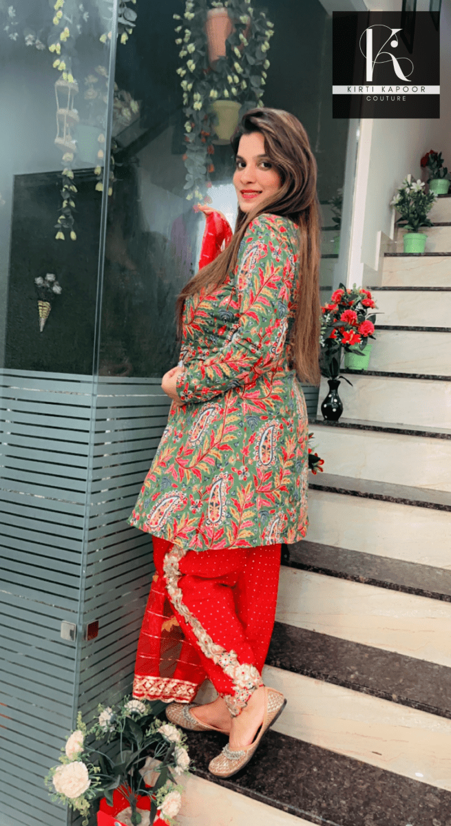 Green Peplum Dhoti Suit With Red Dupatta - Kirti Kapoor Couture