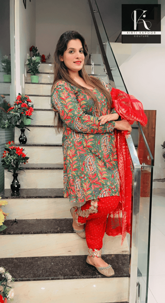 Green Peplum Dhoti Suit With Red Dupatta - Kirti Kapoor Couture