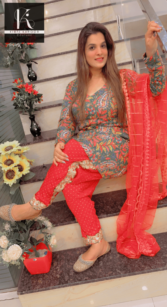 Green Peplum Dhoti Suit With Red Dupatta - Kirti Kapoor Couture