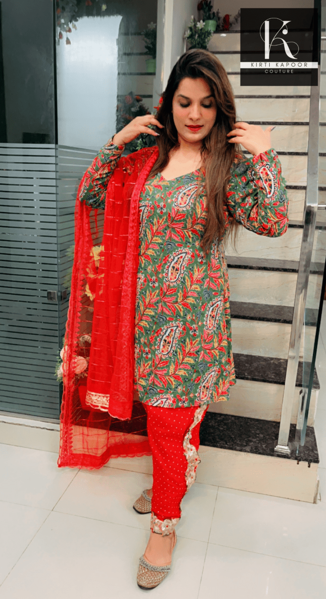 Green Peplum Dhoti Suit With Red Dupatta - Kirti Kapoor Couture
