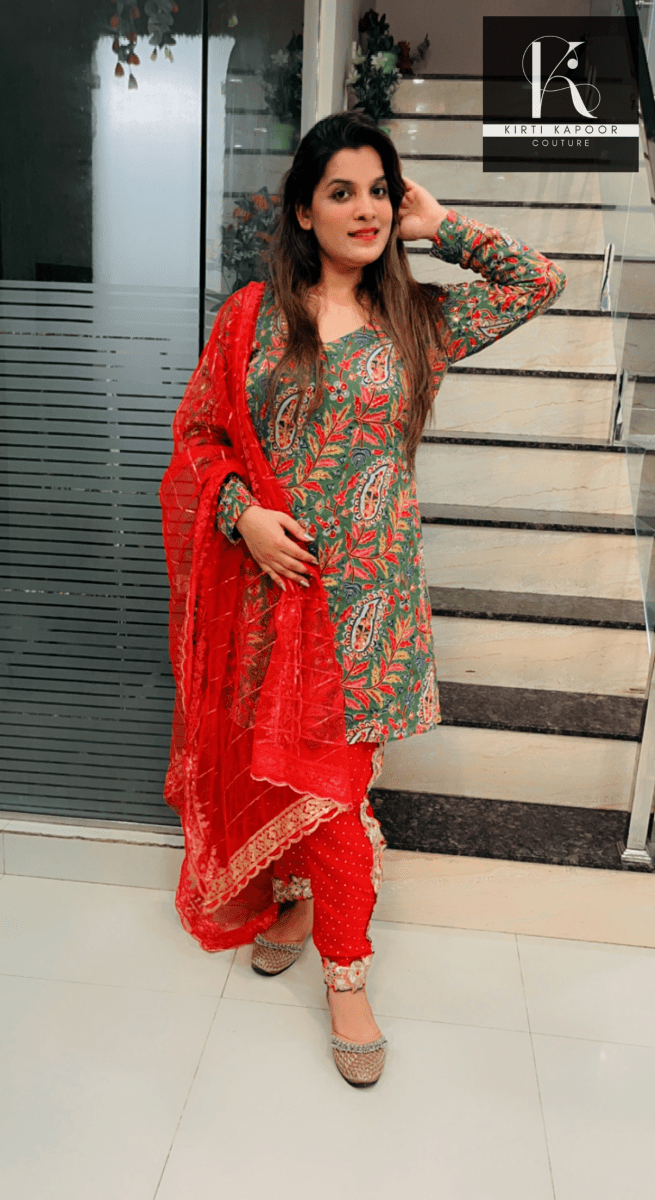 Green Peplum Dhoti Suit With Red Dupatta - Kirti Kapoor Couture