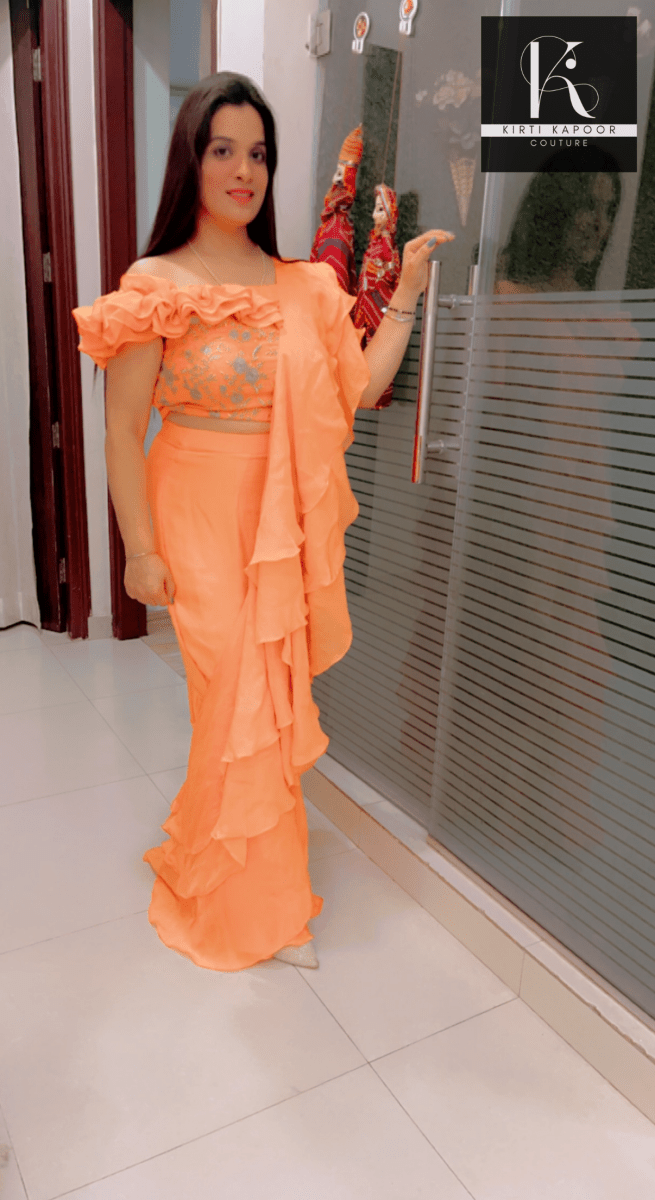 Orangish - Peach Flaired Saree by Kirti Kapoor - Kirti Kapoor Couture