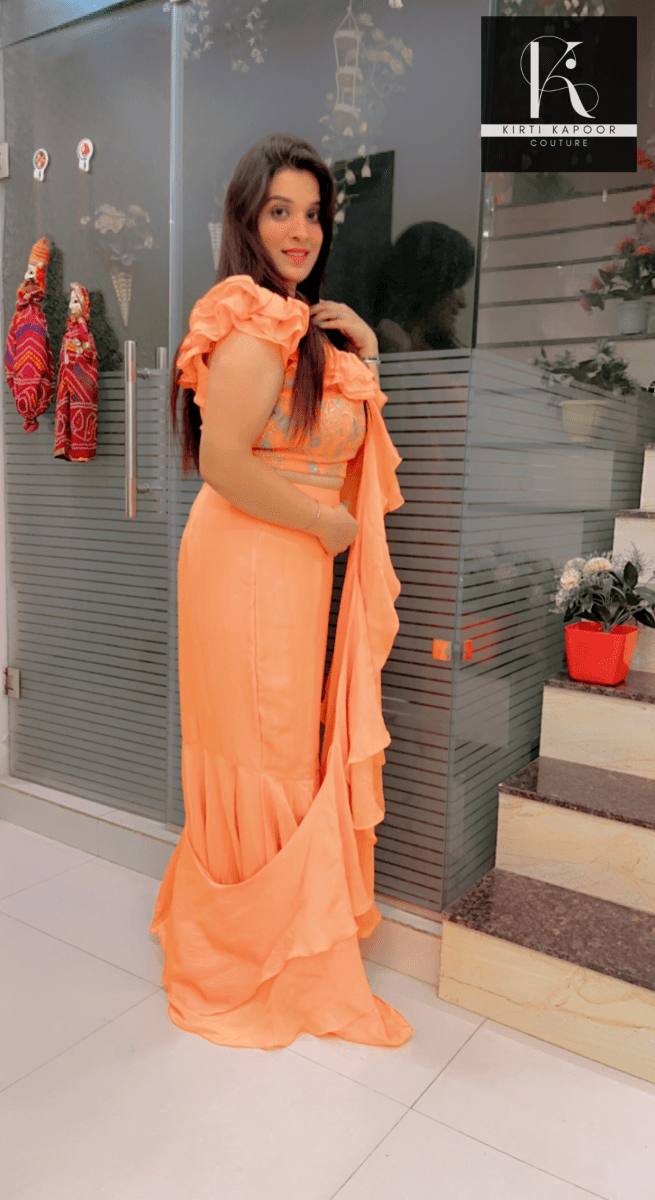 Orangish - Peach Flaired Saree by Kirti Kapoor - Kirti Kapoor Couture