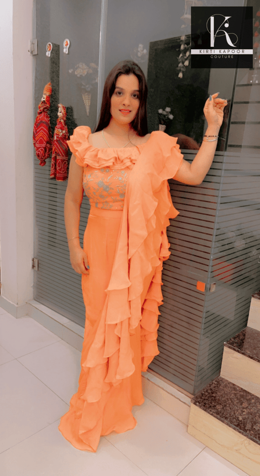 Orangish - Peach Flaired Saree by Kirti Kapoor - Kirti Kapoor Couture