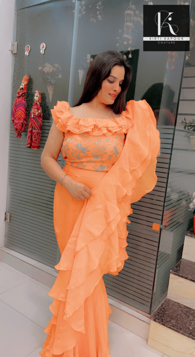 Orangish - Peach Flaired Saree by Kirti Kapoor - Kirti Kapoor Couture