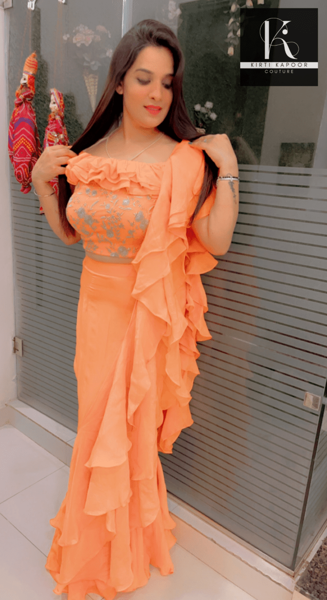 Orangish - Peach Flaired Saree by Kirti Kapoor - Kirti Kapoor Couture