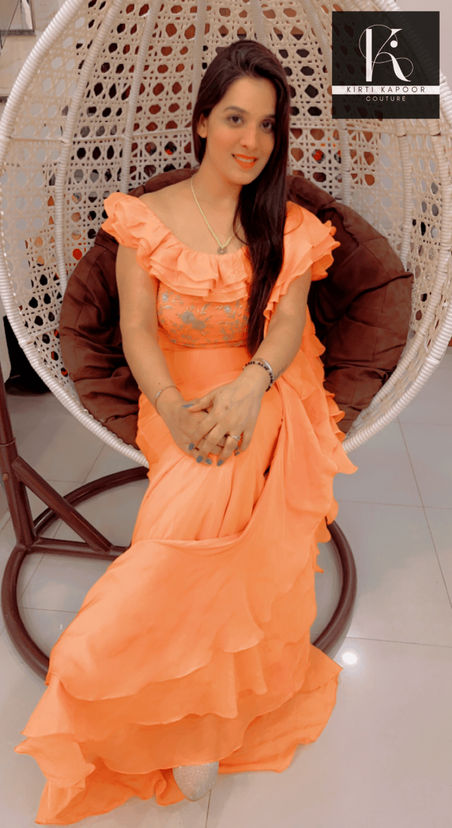 Orangish - Peach Flaired Saree by Kirti Kapoor - Kirti Kapoor Couture