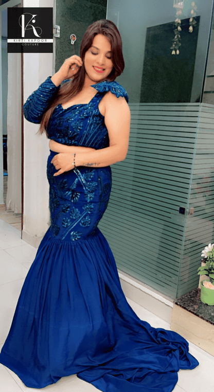 Blue Heavy Choli and fish - cut skirt with attached trail - Kirti Kapoor Couture