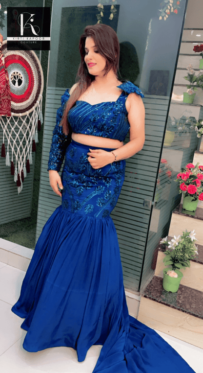 Blue Heavy Choli and fish - cut skirt with attached trail - Kirti Kapoor Couture