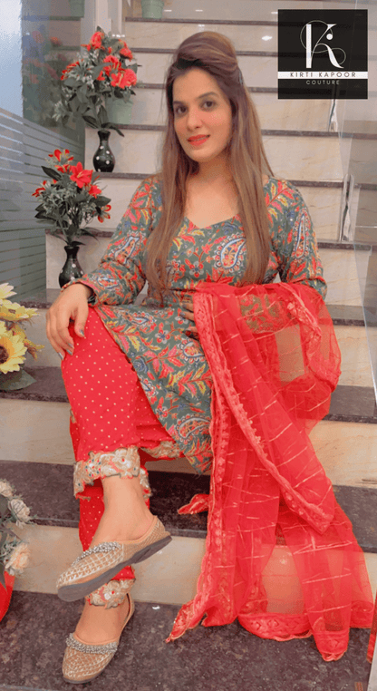Green Peplum Dhoti Suit With Red Dupatta - Kirti Kapoor Couture