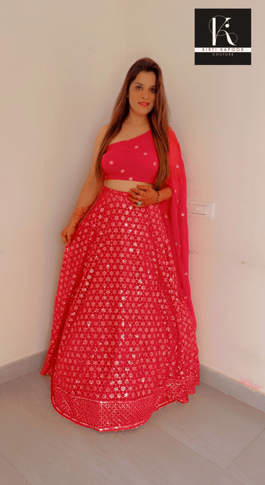 Pink Lehenga Choli with one - sided Sleeve - Kirti Kapoor Couture