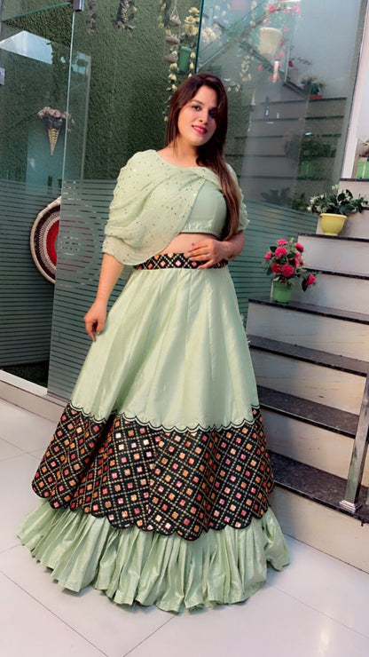 Sea - Foam Designer Lehenga Choli with Peacock (Fabric) Highlights - Kirti Kapoor Couture